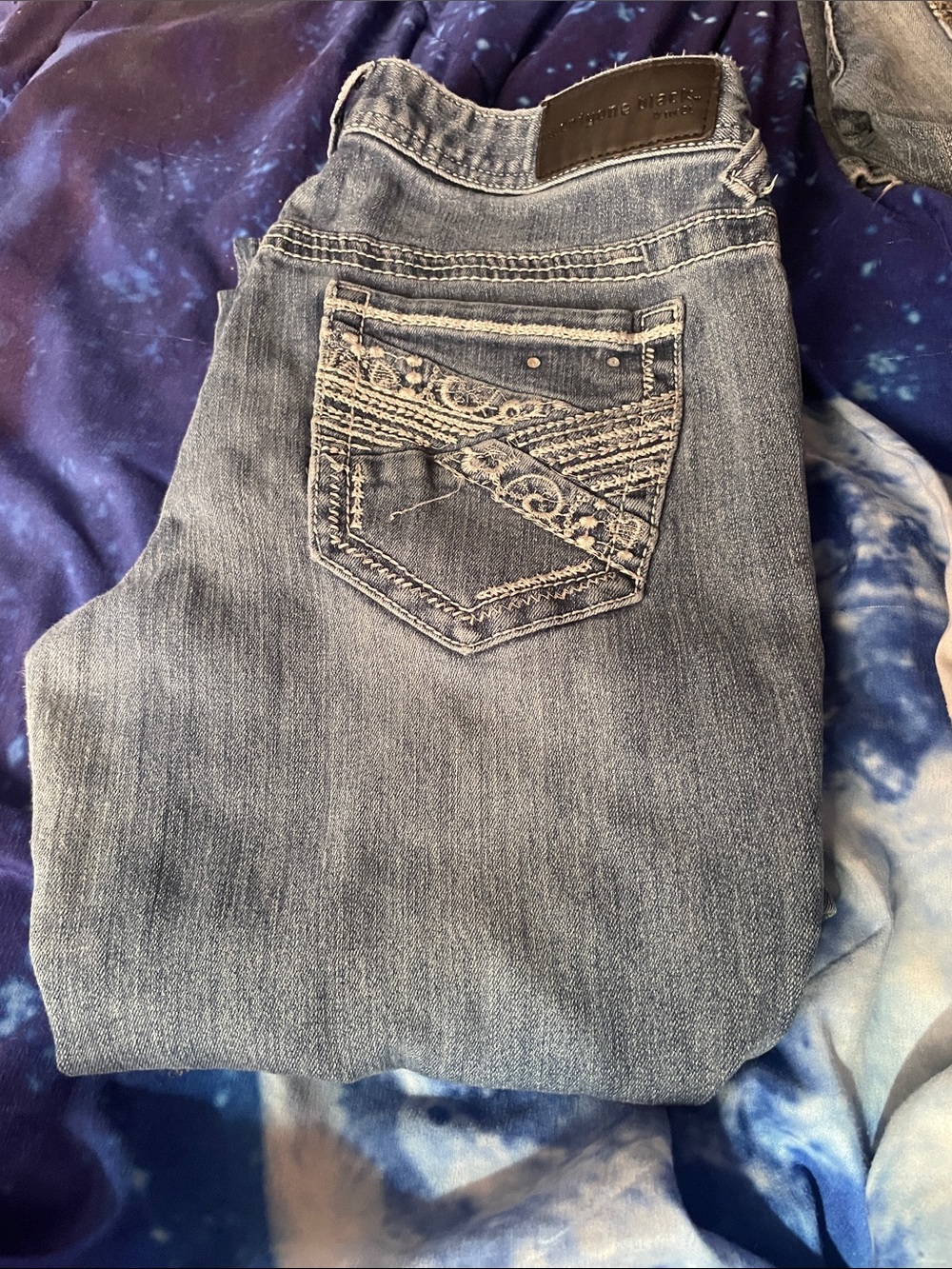 Distressed Light Blue Bootcut Jeans with Embroidered Back Pocket